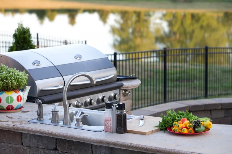 Outdoor kitchen counter with a built-in grill