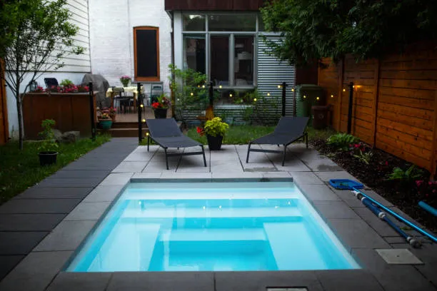 small relaxing backyard swimming pool