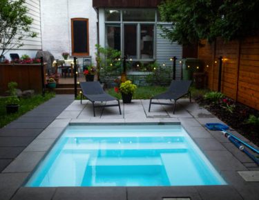 small relaxing backyard swimming pool