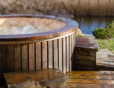 steaming hot wood covered Jacuzzi GTLAD